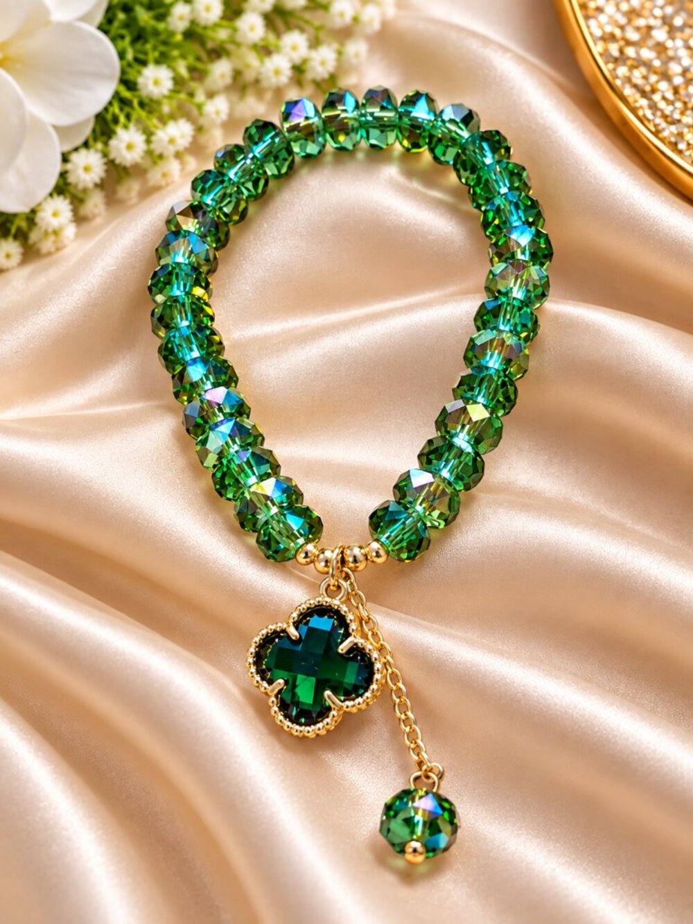 Green crystal stretch bracelet featuring sparkling faceted beads